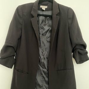 H&M black women’s blazer with cinched sleeves